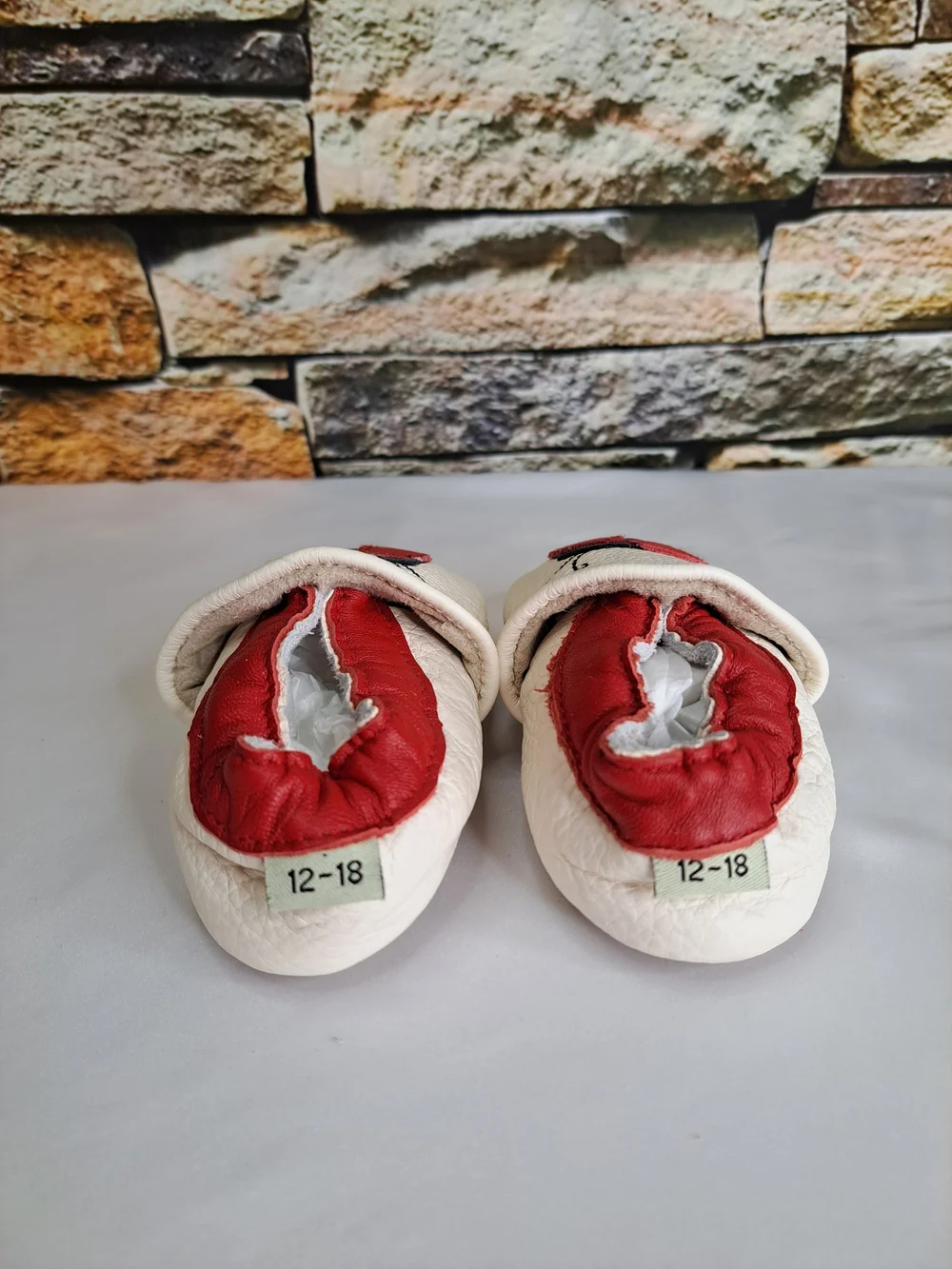 Baby White Leather Slip-On Shoes with Red Ladybug Detail